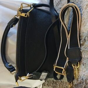 Elegant Black Handbag with Gold Accents